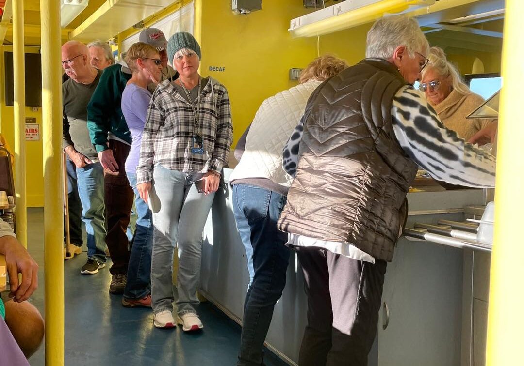 group enjoying sip and sail cruise