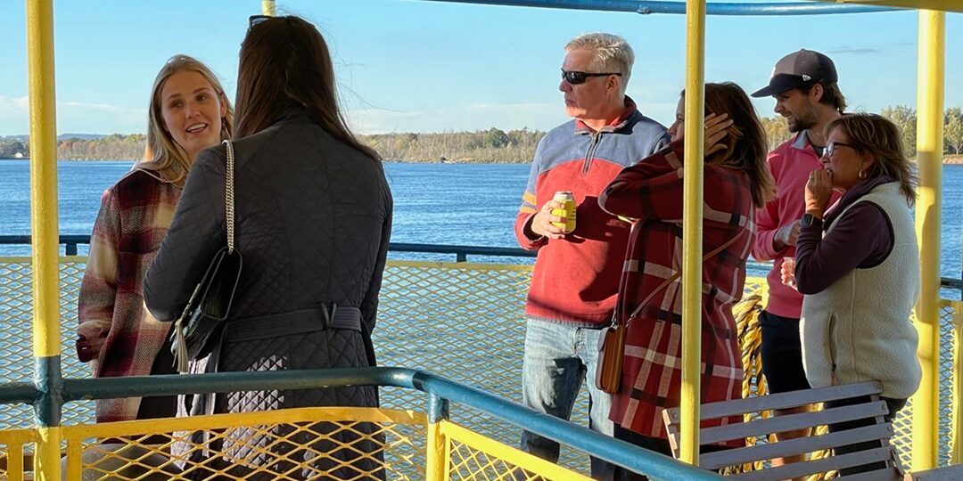 group enjoying sip and sail cruise